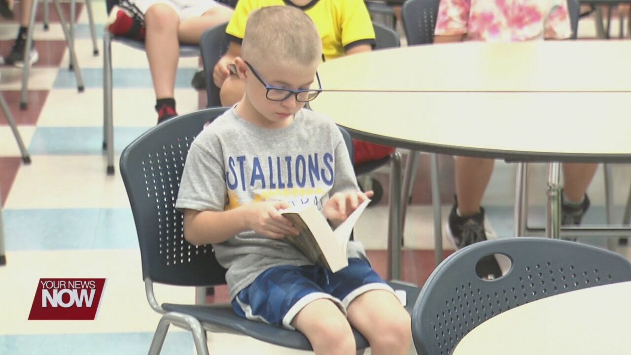 St. Marys Rotary Club hands out dictionaries to third grade students